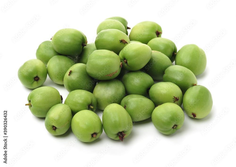 mini kiwi baby fruit (actinidia arguta) on white background mini kiwi baby fruit (actinidia arguta) on white background