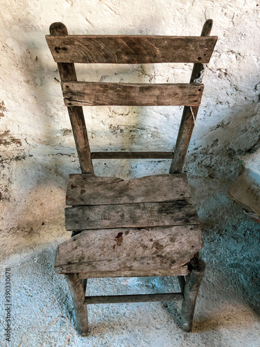 Принти на полотні Obsolete and worn wooden brown chair.