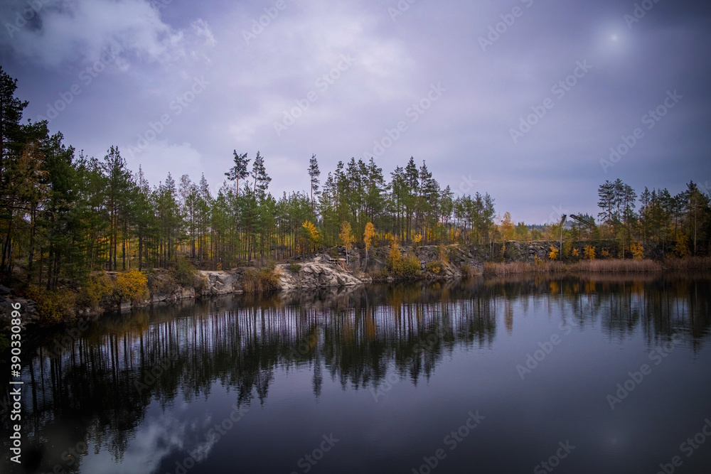 lake in autumn and reflection of trees in lake