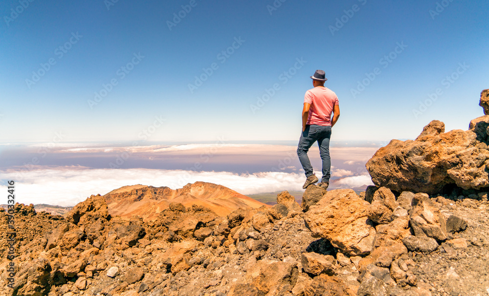 hiker on the top in mountains teide volcano tenerife spain 