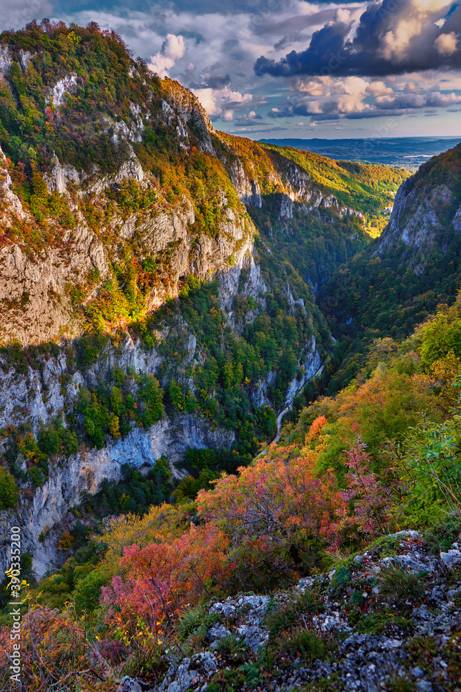 Mountain cliffs and a canyon in the fall