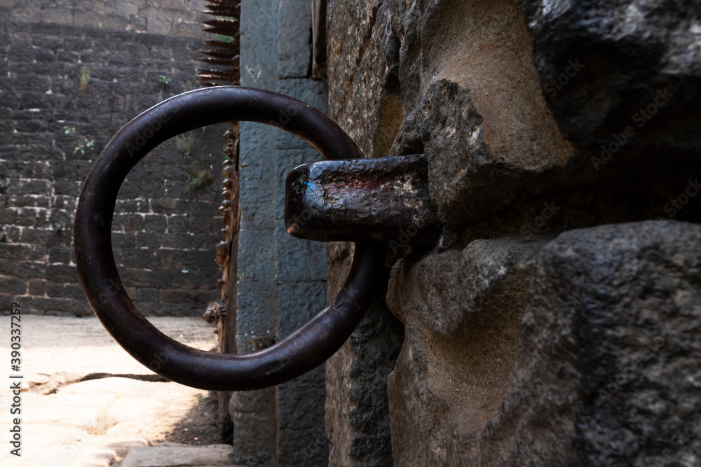 door metal ring chain isolated in Kalaburagi fort back entrance gate wall door metal ring chain isolated in Kalaburagi fort back entrance gate wall