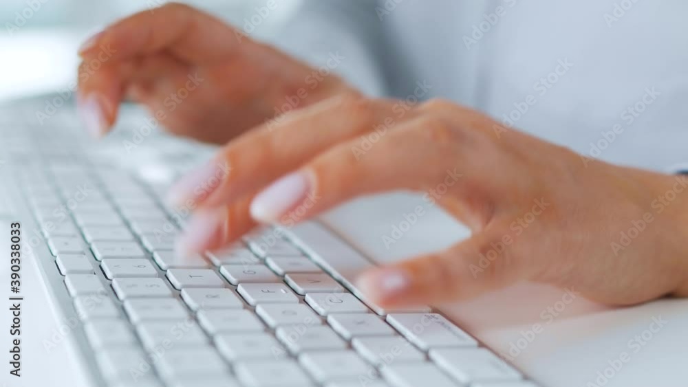 Female hands typing on a computer keyboard. Concept of remote work. Female hands typing on a computer keyboard. Concept of remote work.