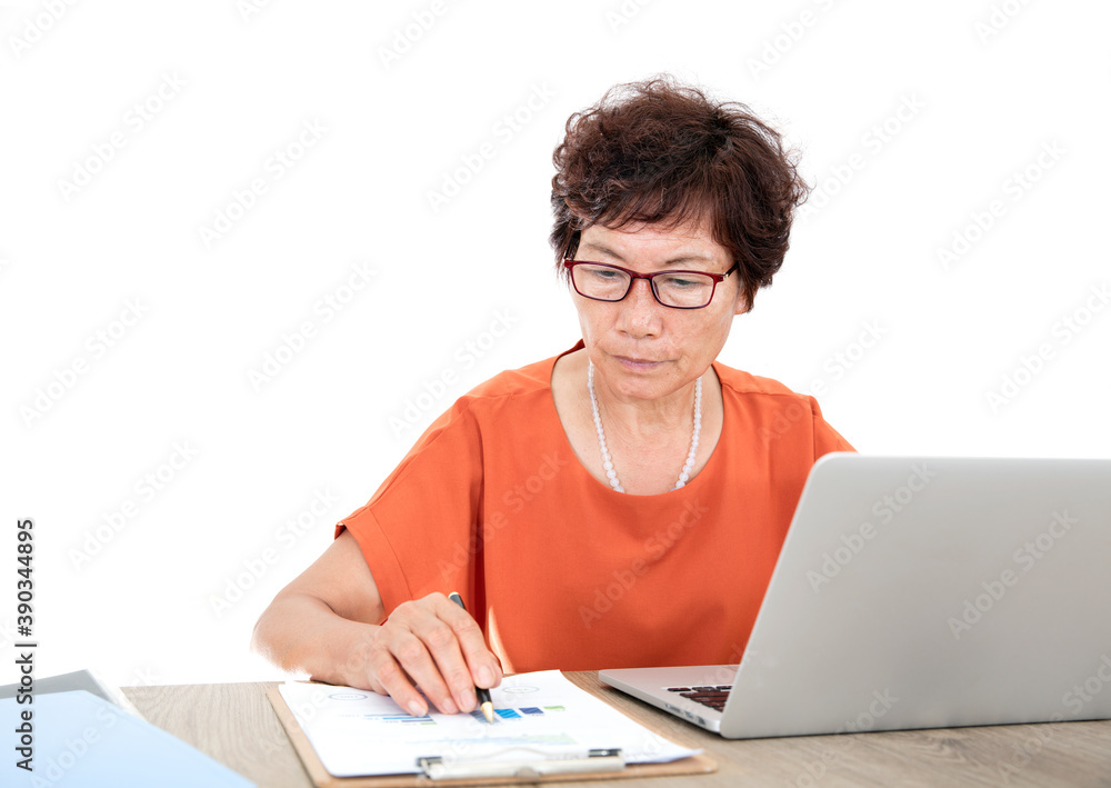 Chinese older women are working in front of a laptop Chinese older women are working in front of a laptop