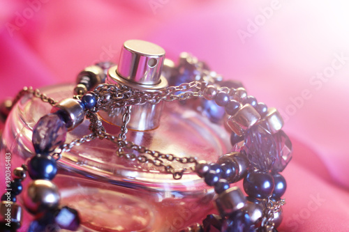 Women's perfume beautiful beads on a pink dress