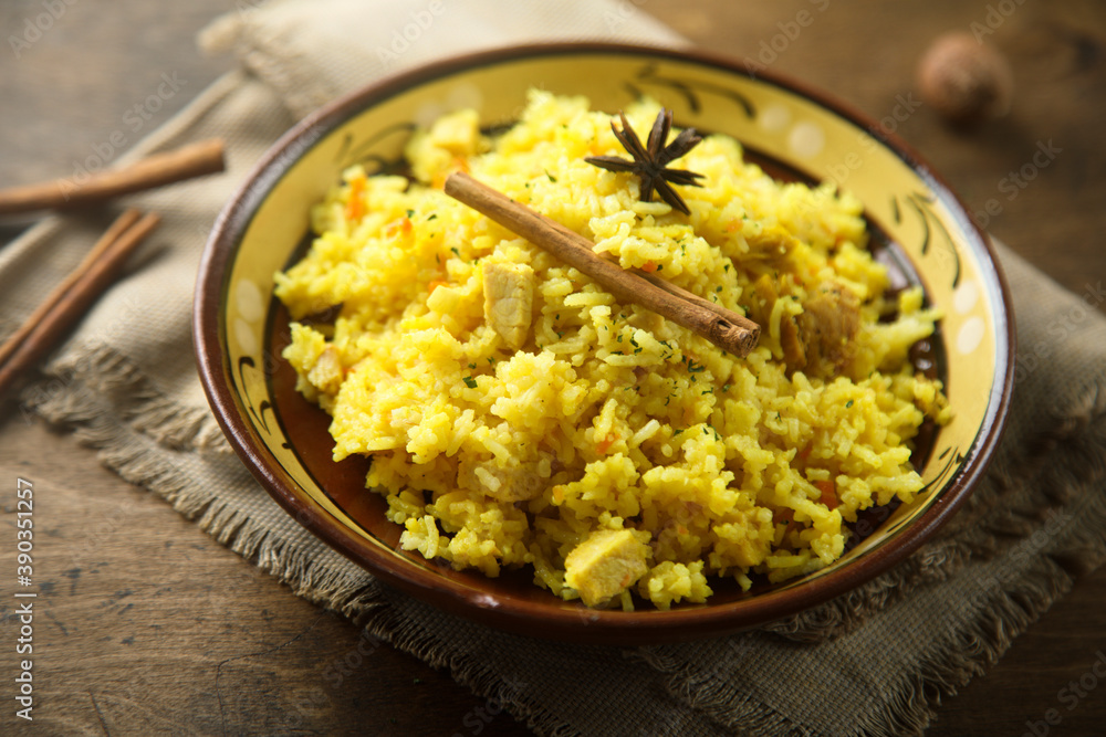 Delicious rice with spices in a bowl Delicious rice with spices in a bowl