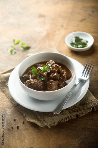 Traditional homemade beef ragout with fresh parsley
