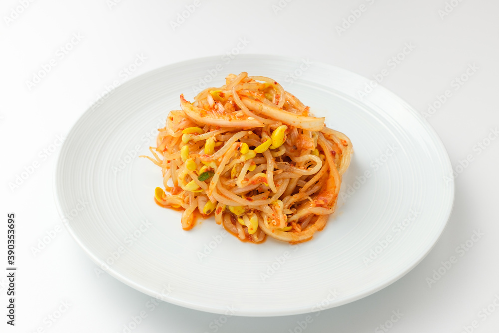Tossed bean sprouts on a white background Tossed bean sprouts on a white background