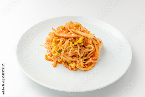 Tossed bean sprouts on a white background