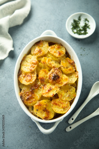 Traditional homemade potato gratin with cheese
