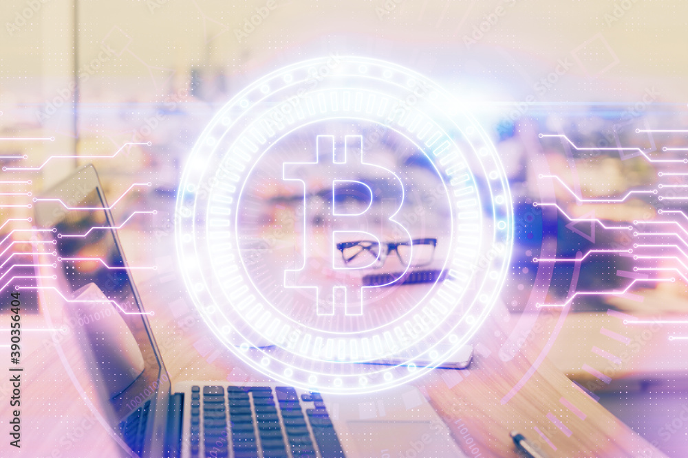 Double exposure of blockchain theme hologram and table with computer background. Concept of bitcoin crypto currency. Double exposure of blockchain theme hologram and table with computer background. Concept of bitcoin crypto currency.