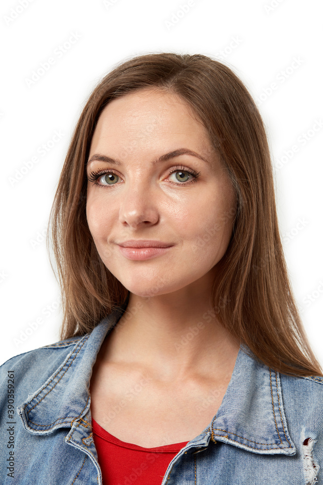 Vertical portrait of a beautiful young blonde woman looking at the camera. White isolated background. Vertical portrait of a beautiful young blonde woman looking at the camera. White isolated background.