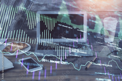 Multi exposure of forex chart and work space with computer. Concept of international online trading. © peshkova