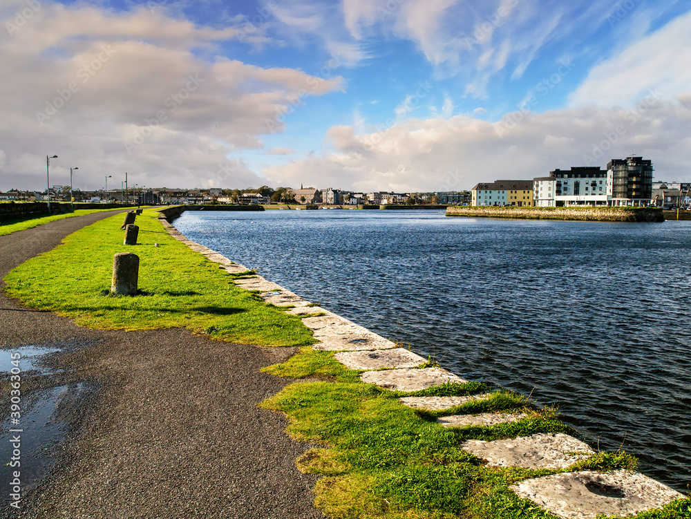 Nimmo's pier and river Corrib, Galway city, Ireland. Warm sunny day. Nobody, Beautiful cloudy sky.