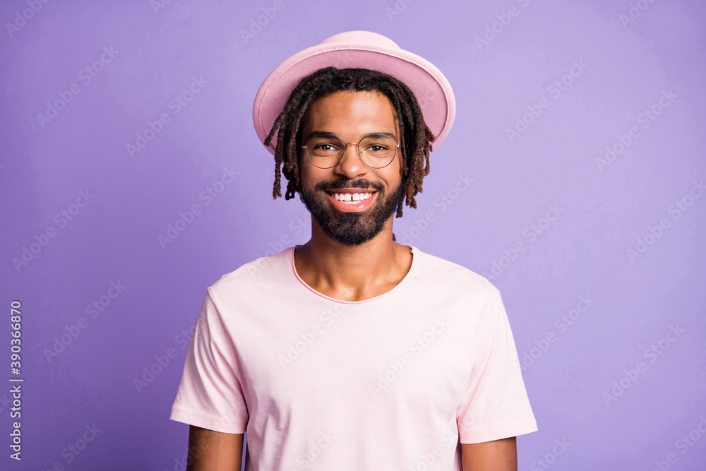 Photo portrait of smiling man isolated on vivid purple colored background Photo portrait of smiling man isolated on vivid purple colored background