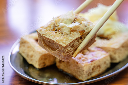 Deep fried stinky tofu with pickled cabbage, famous and delicious street food in Taiwan.