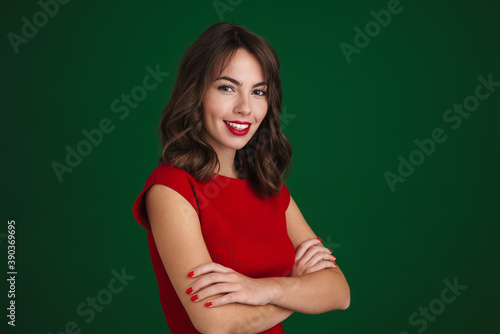 Beautiful happy brunette girl smiling and looking at camera