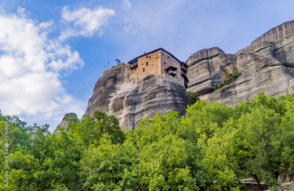 A view from below of the Holy Monastery of St. Nicholas Anapausas in Meteora, Greece