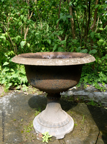 Old metal sink for draining water.