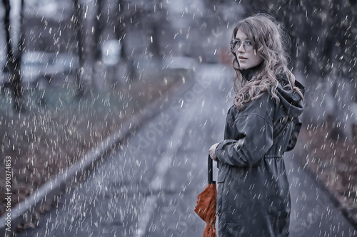 seasonal autumn portrait  sad girl with umbrella  november seasonal virus immunity on a walk