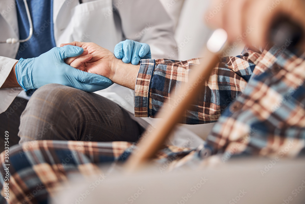Fototapeta premium Healthcare professional conducting the patient medical examination