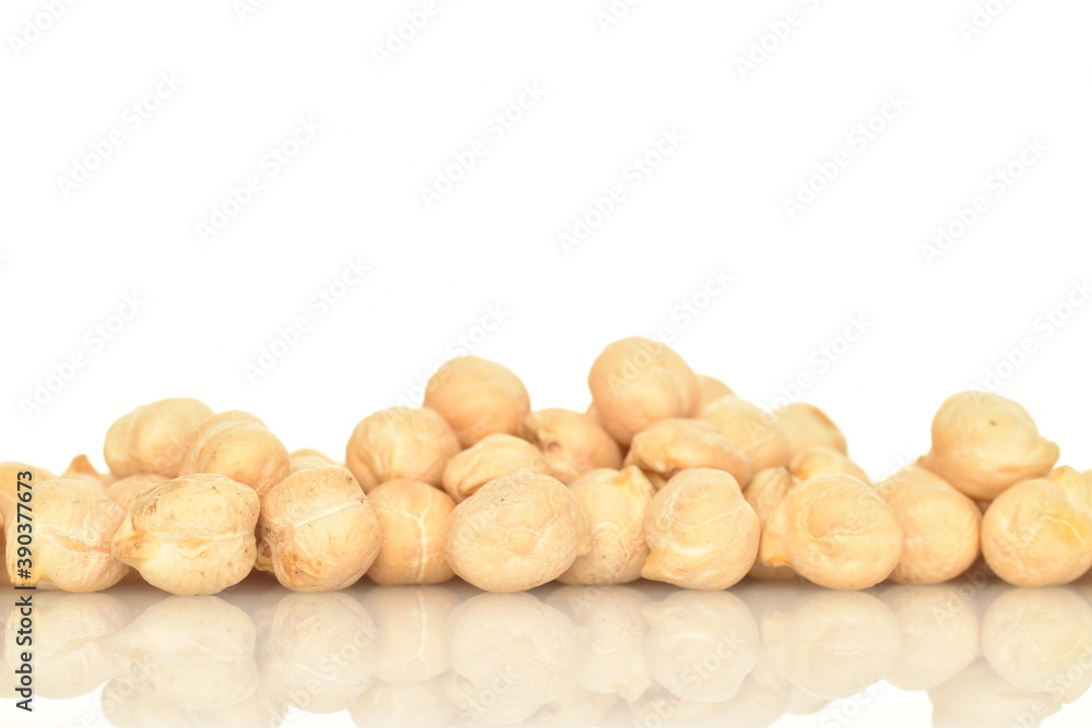 Uncooked hummus grains, close-up, isolated on white. Uncooked hummus grains, close-up, isolated on white.