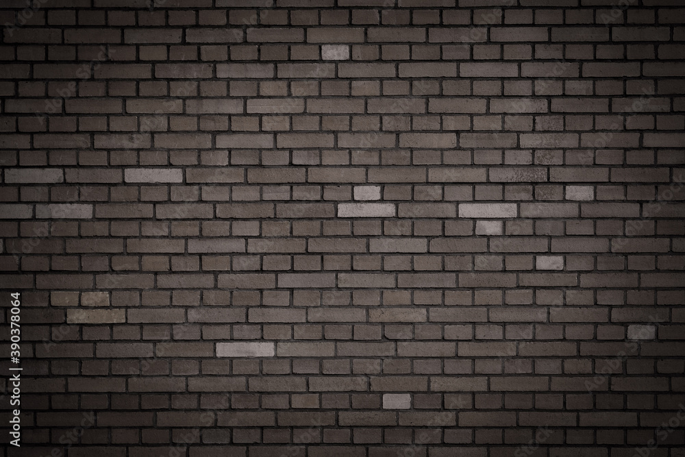 brick wall with a pale shade of brown with vignetting. wallpaper, background