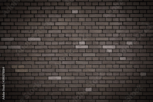 brick wall with a pale shade of brown with vignetting. wallpaper, background