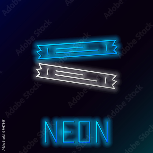 Glowing neon line Sugar stick packets icon isolated on black background. Blank individual package for bulk food products as coffee, salt, spices. Colorful outline concept. Vector.