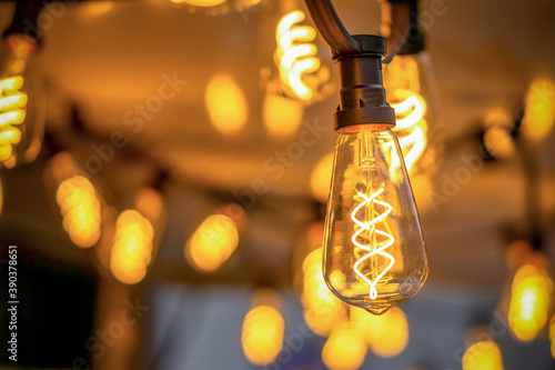 garland of incandescent lamps with blurred background. background, wallpaper