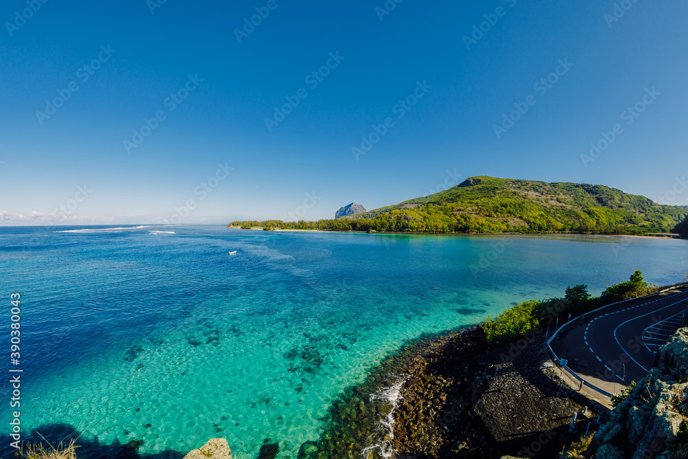 View to Le Morne from Maconde point with ocean and sunlight in Mauritius
