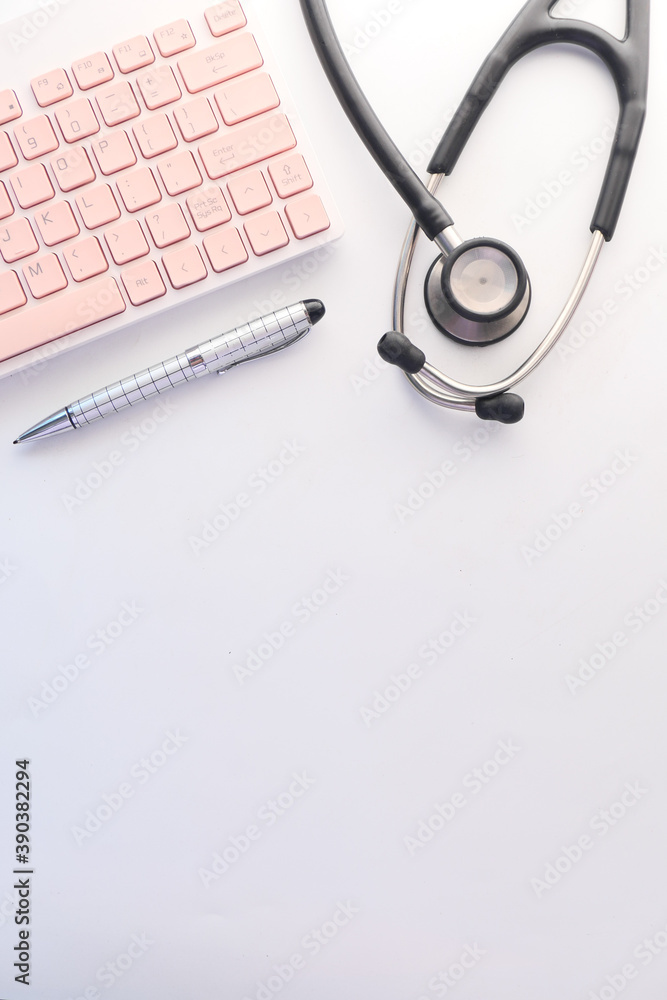 doctors workplace with container, keyboard and prescription on desk. doctors workplace with container, keyboard and prescription on desk.