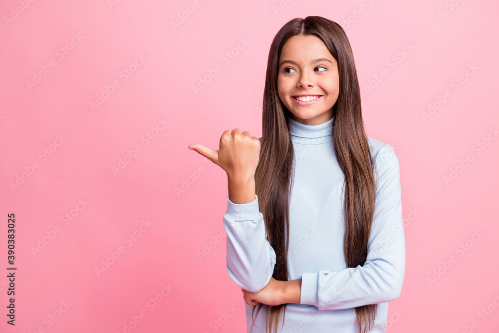Portrait of attractive cheerful girl showing copy space advice look isolated over pink pastel color background Portrait of attractive cheerful girl showing copy space advice look isolated over pink pastel color background