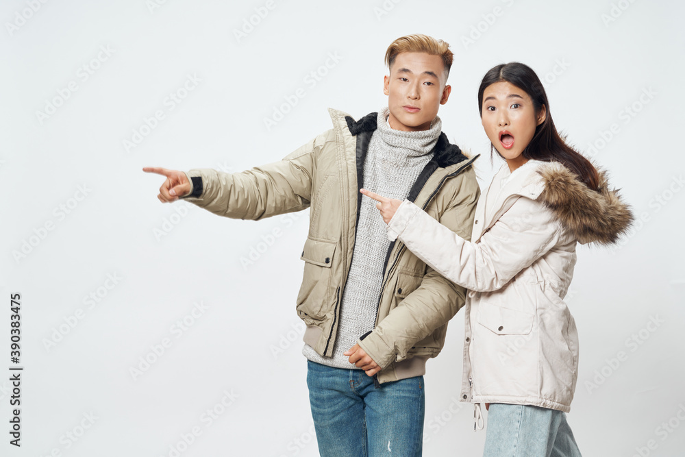 Man and woman in winter jackets communicating Copy Space Man and woman in winter jackets communicating Copy Space