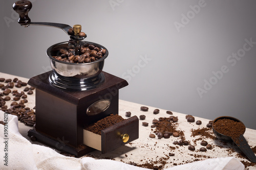 wonderful and reliable old mechanical eco-friendly coffee grinder made of wood