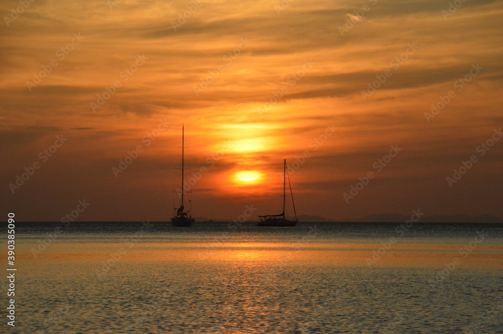 Sunset over the beaches on the untouced paradise island of Ko Phayam in the Andaman Sea, Thailand