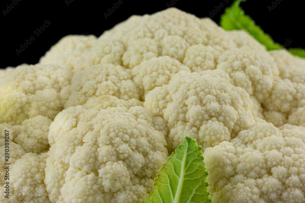 Cauliflower Head on a Black Background. Healthy Eating Organic Food Vegetables Cauliflower Head on a Black Background. Healthy Eating Organic Food Vegetables