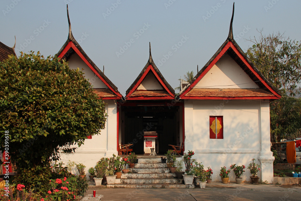 buddhist temple (wat may souvannaphoum) in luang prabang (laos)