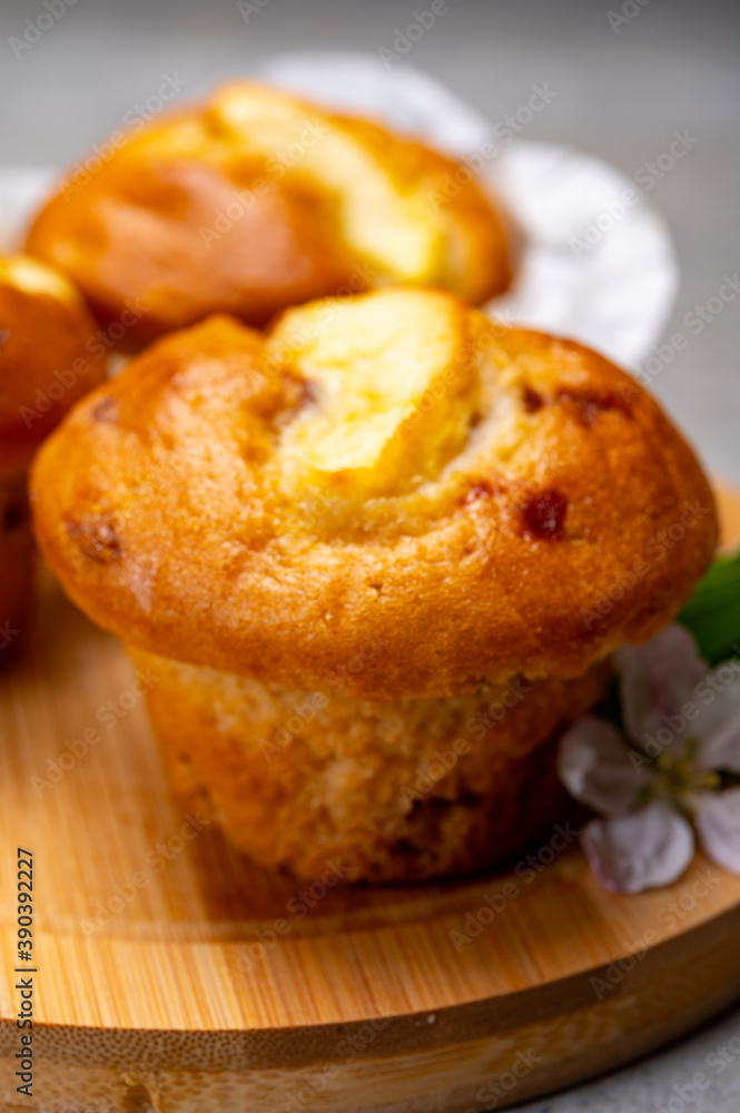 Fresh baked muffins with apple and cinnamon close up