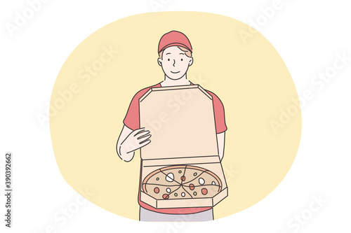 Pizza, home food delivery concept. Young smiling man boy courier supplier cartoon character standing with online order pizza cutting on slices. Fast supply service and ordering takeout illustration.