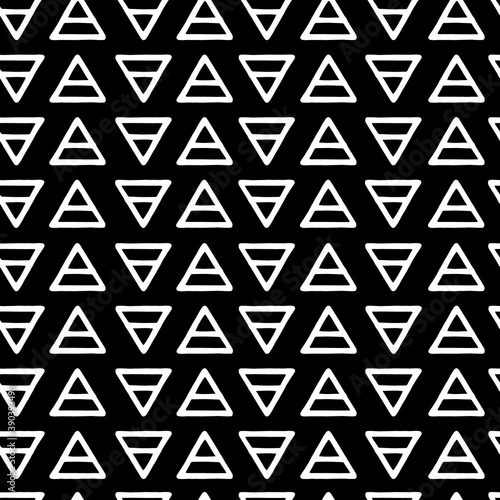 Vector geometric pattern with white triads on black background. Seamless pattern can be used for wallpaper, pattern fills, web page background, surface textures.