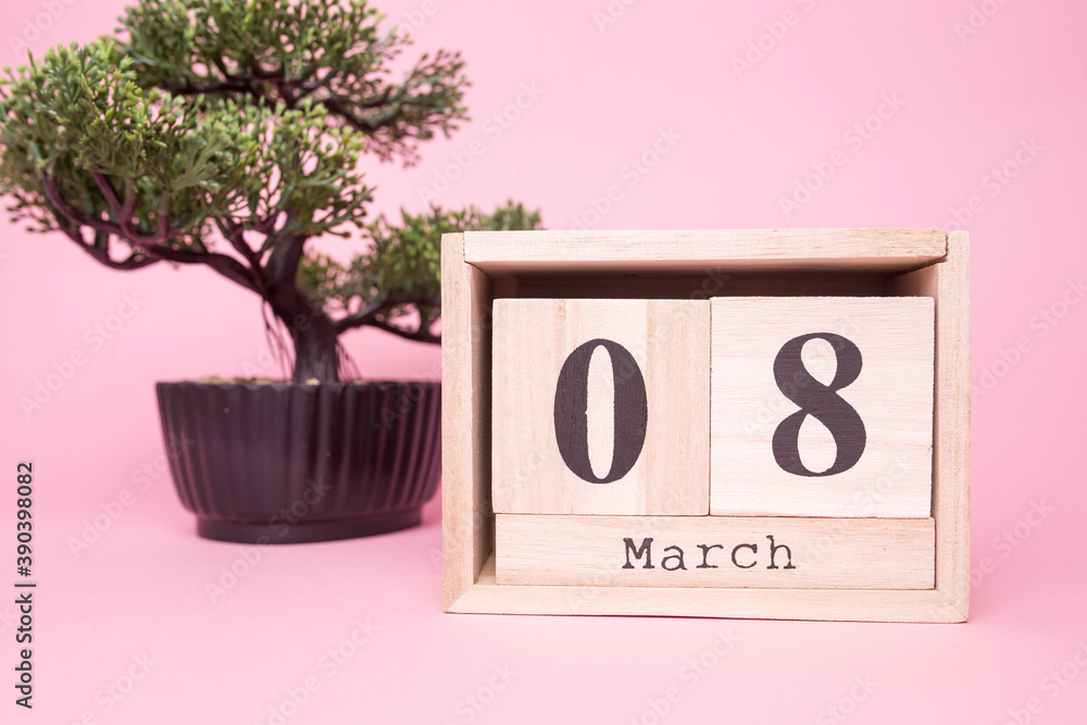 custom made wallpaper toronto digitalWomen's day March 8th. Wooden calendar on a pink background close-up. March 8.