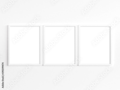 Three 8x10 white frames with portrait orientation. 3D illustration.