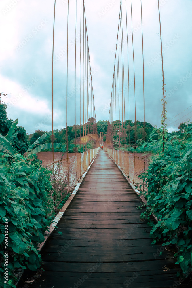 suspension bridge over the river, indonesia.