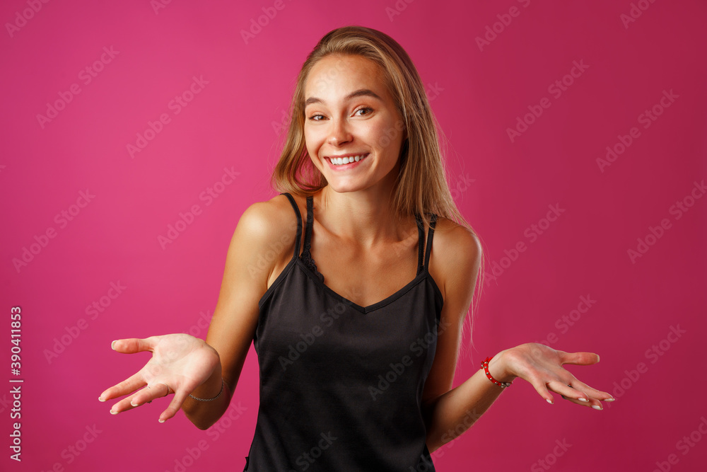 Amazed young woman gesturing that she doesn't know. Amazed young woman gesturing that she doesn't know.