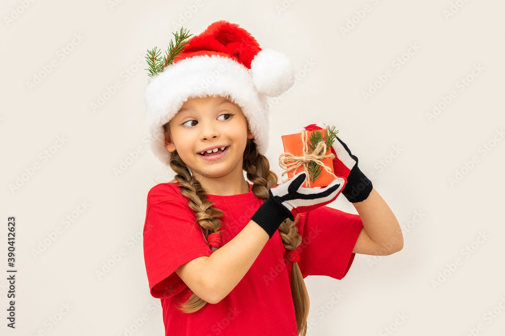 A little girl was given a gift for the new year. A little girl was given a gift for the new year.