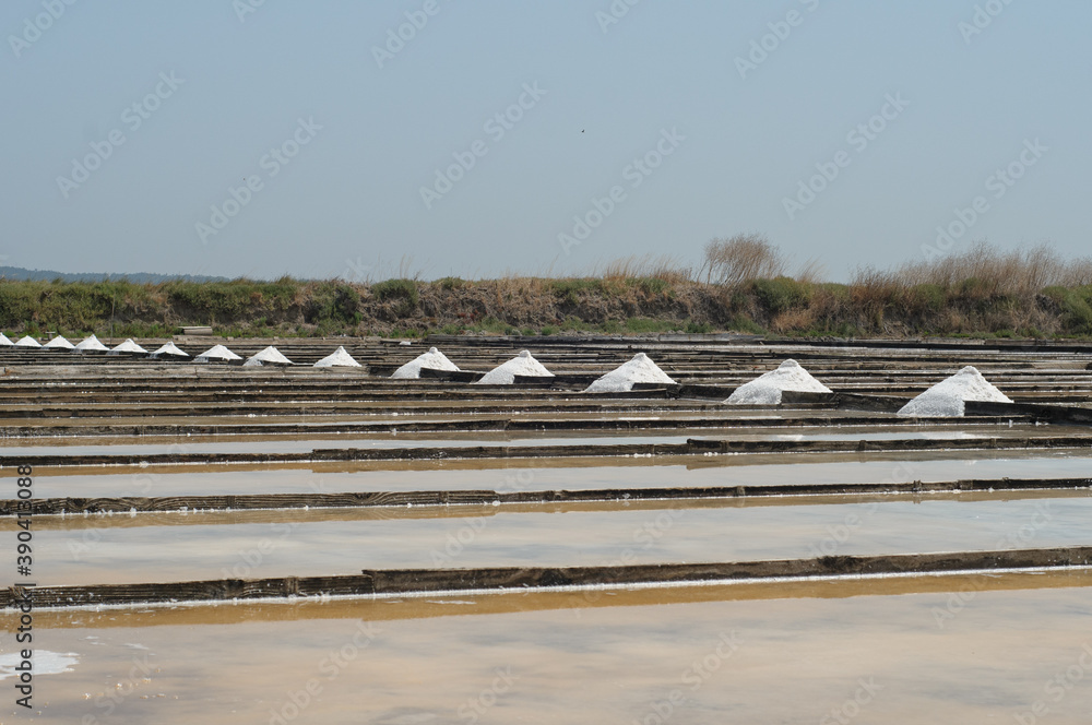 Naklejka premium salt flats with piles of salt built up