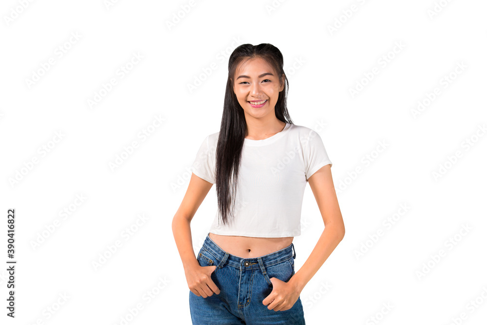 Obraz premium Alluring young asian woman in white t-shirt and blue jeans. isolated