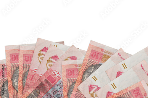 10 Ukrainian hryvnias bills lies on bottom side of screen isolated on white background with copy space. Background banner template photo