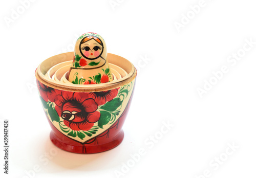 фотографія Small matryoshka head sticking out of the assembled bottom of the set